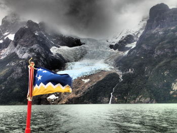 Scenic view of sea against cloudy sky