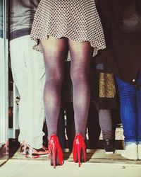 Low section of women standing on floor