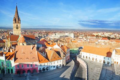 High angle view of townscape against sky in city