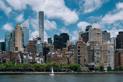 Buildings in city against sky