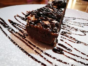 Close-up of cake served on table