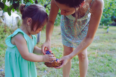 Mother and girl playing