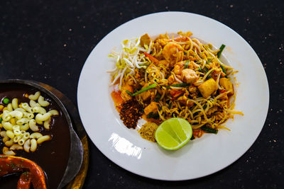 Thaifood,fresh shrimp pat thai on the dining table