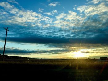 Scenic view of silhouette landscape against sky during sunset
