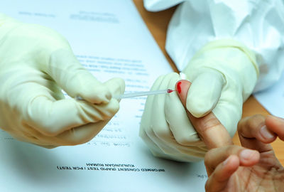 Close-up of hand holding hands