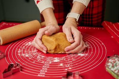 Cropped hand of person holding food
