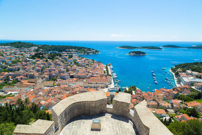 High angle view of town by sea