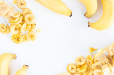 High angle view of bananas against white background