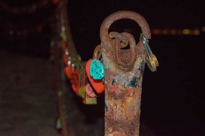 no people, rusty, paint, outdoors, night, close-up, black background