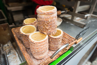 High angle view of trdelniks served in tray at bakery