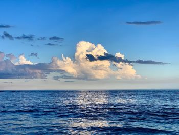 Scenic view of sea against blue sky