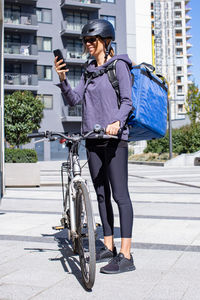 Female delivery person receiving order