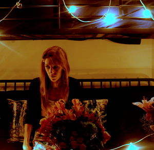 Portrait of woman at night