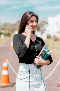 Young woman using mobile phone