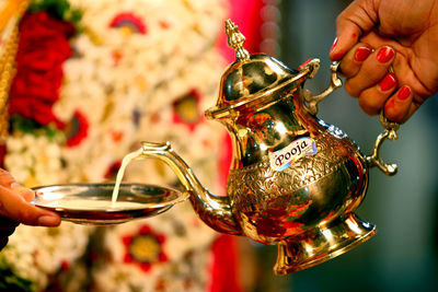 Close-up of person holding wineglass