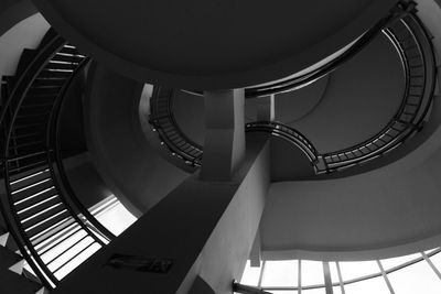 Low angle view of spiral staircase in building