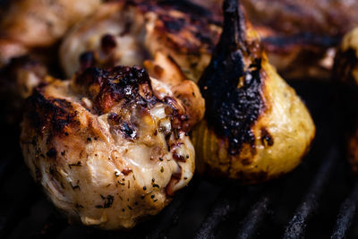 High angle view of meat on barbecue