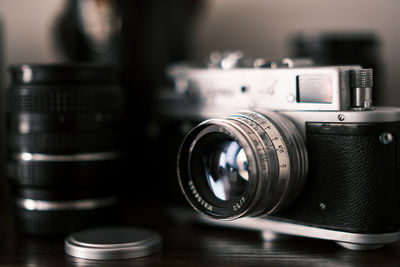 Close-up of camera on table