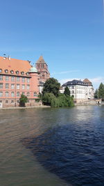 View of river with buildings in background