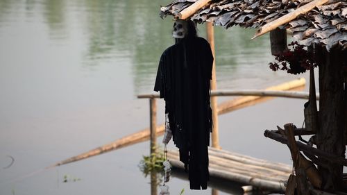 Close-up of clothes hanging on lake