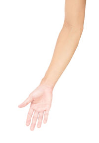 Close-up of hand over white background