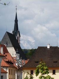 Houses and buildings against sky