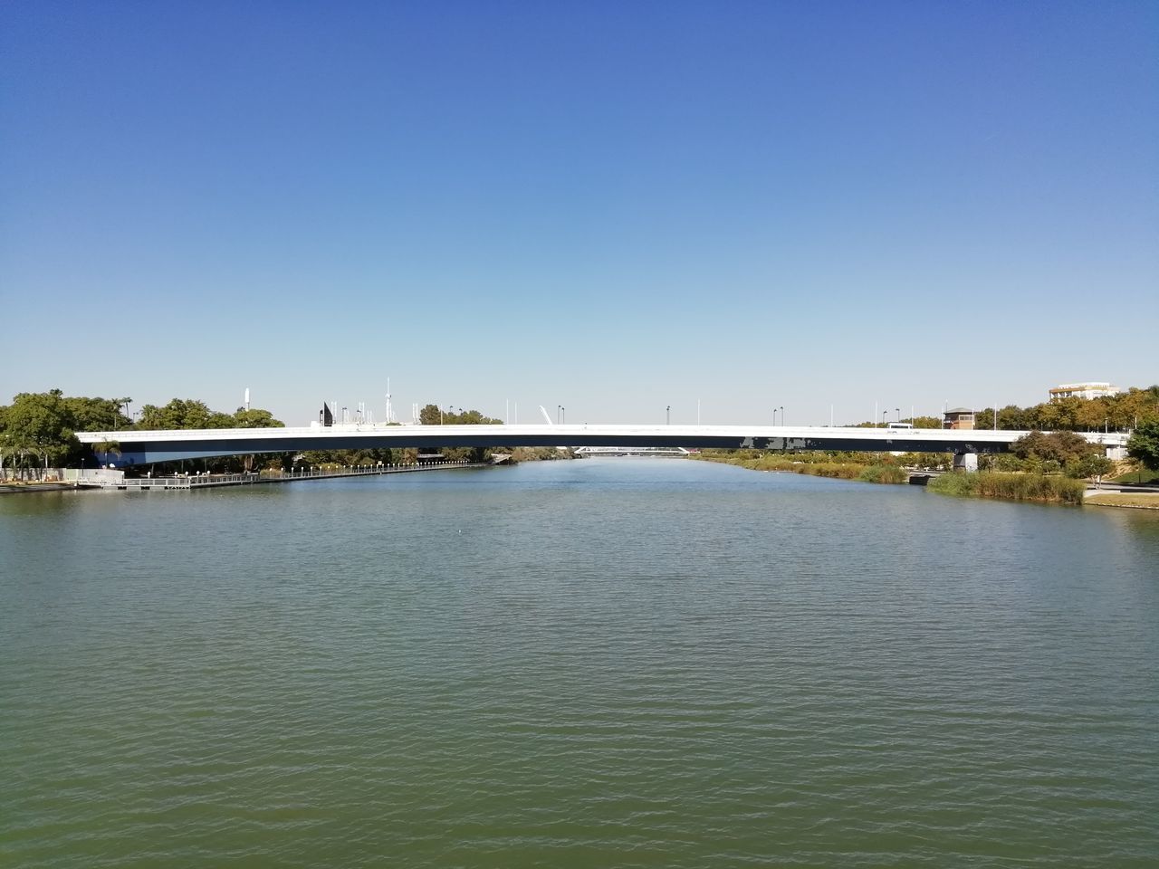 SCENIC VIEW OF RIVER AGAINST CLEAR SKY