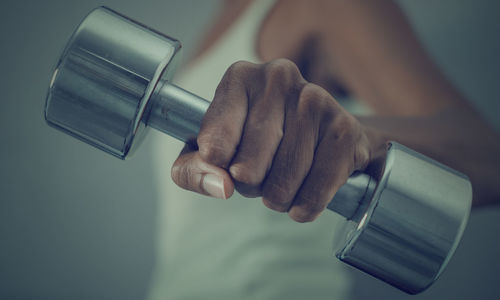 Close-up of man holding camera