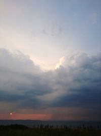 Scenic view of silhouette land against sky during sunset