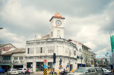 Built structure against cloudy sky