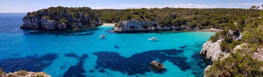 Panoramic shot of rocks by sea