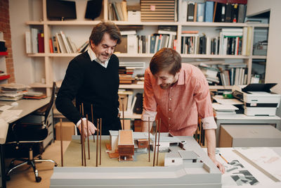 Friends working on table