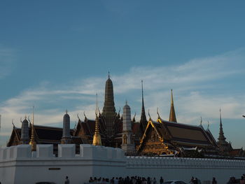 Panoramic view of buildings in city against sky