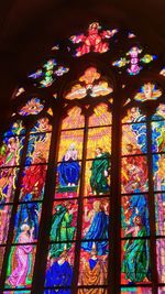 Low angle view of stained glass window in temple