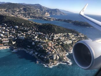 Aerial view of sea and cityscape