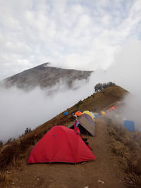 Tent on land against sky