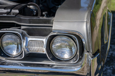 Close-up of vintage car headlights