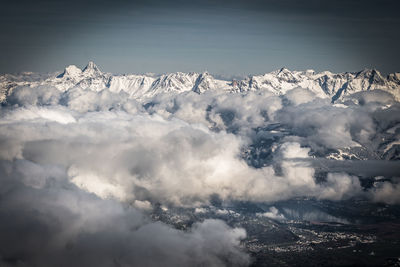 Scenic view of snowcapped mountains against sky