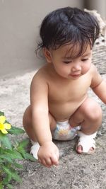 Cute baby boy looking at camera