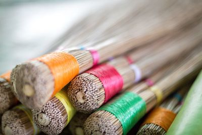 Close-up of brooms