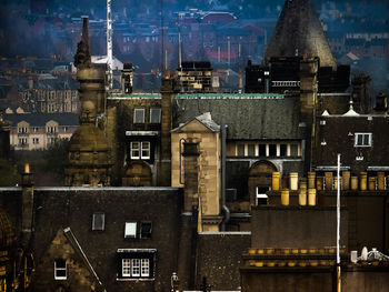 Buildings in city at night