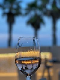 Close-up of wineglass on table