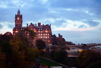 Buildings in city against sky