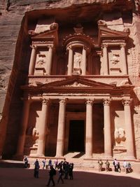 Group of people in front of historical building