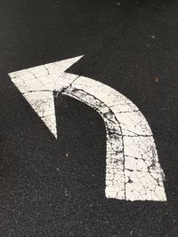 Arrow symbol on road