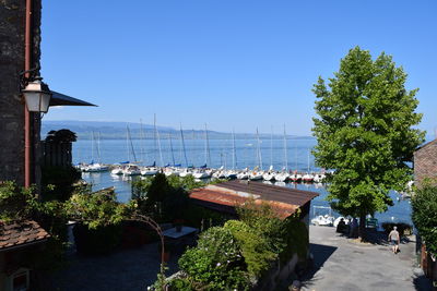 View of calm sea against clear blue sky