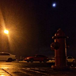 Illuminated street light at night