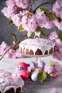 Beautiful easter cake on the table, and colored eggs, homemade cakes, still life