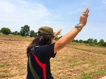 Woman standing on field