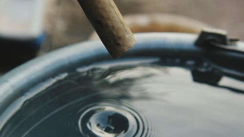 High angle view of cigarette in water